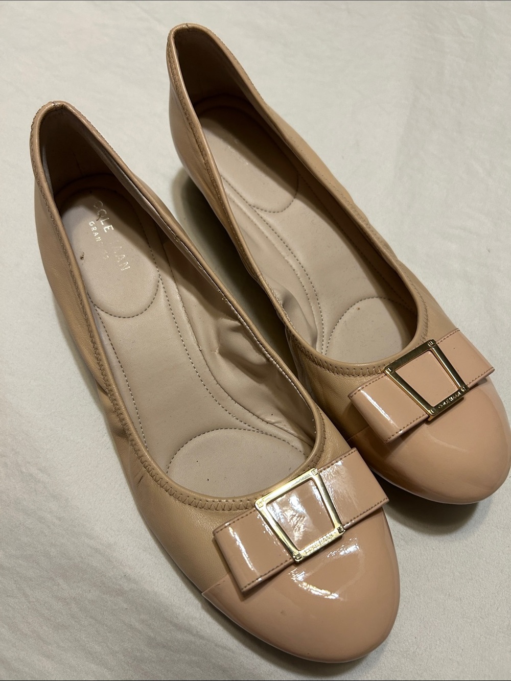 Cole Haan Beige Patent Leather Ballet Flats with Bow Accent